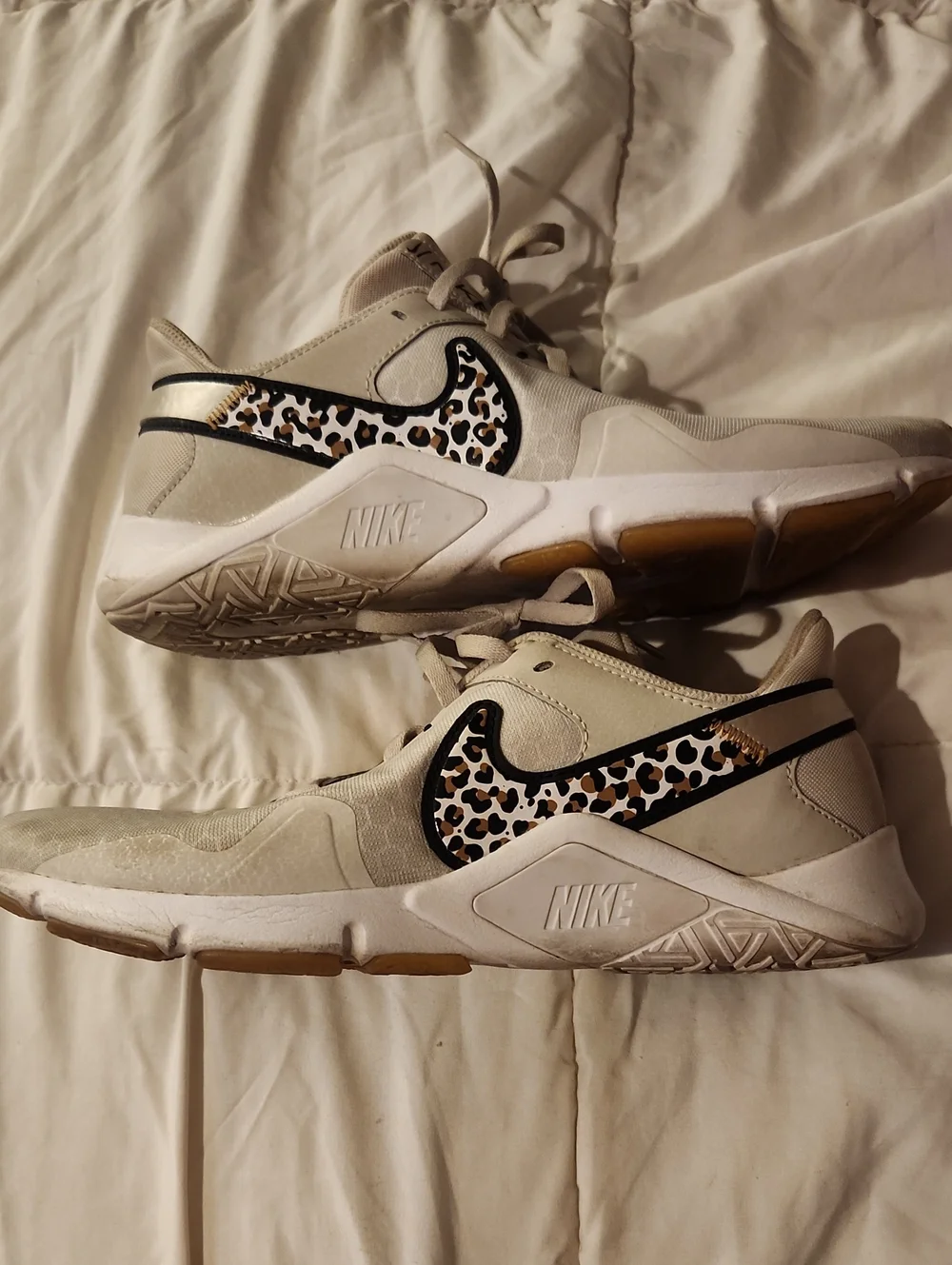 Nike Women’s Cream Athletic Shoes with Leopard Swoosh